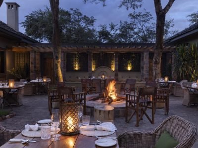 singita_sasakwa_lodge_outdoor_evening_dining_peter_jackson